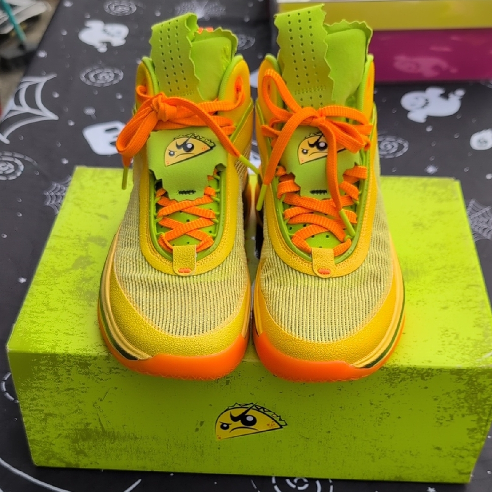 Jordan Sneakers with Orange and Green Accents Jason Tatum